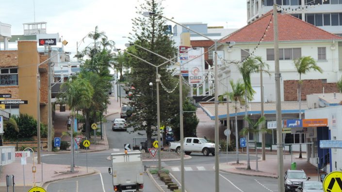 Looking_up_Goondoon_Street_(main_street),_Gladstone,_2014 VMS Board Hire Roads